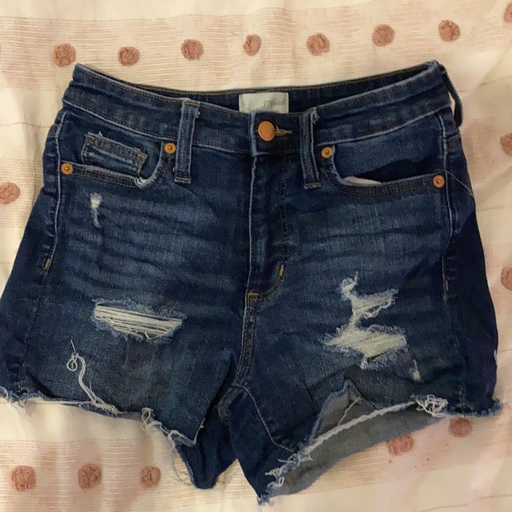 high rise midi ripped shorts. dark wash